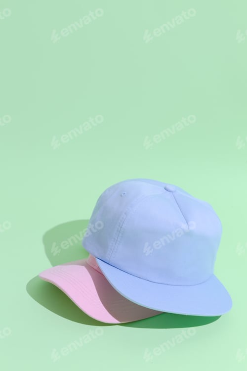 Preview: Urban style flat lay outfit fashion concept. Pastel colours aesthetics. Baseball Caps