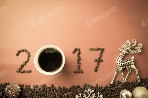 Preview: 2017 Coffee Bean Text And Christmas Decoration On Red Craft Paper For New Year Concept Background