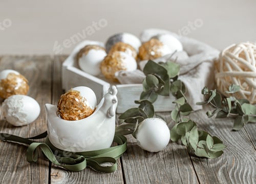 Preview: Spring easter composition with eggs and plants on wooden surface close up.