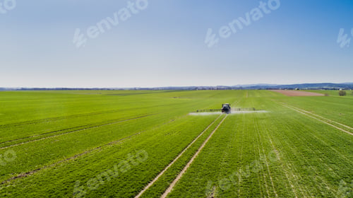 Preview: Tractor Spraying Herbicides on Field Agriculture