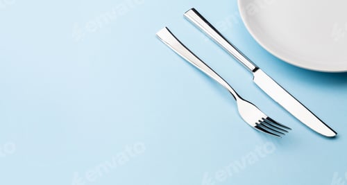 Preview: Empty plate, fork and knife