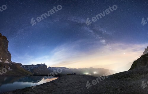 Preview: Landscape of mountains and night sky.