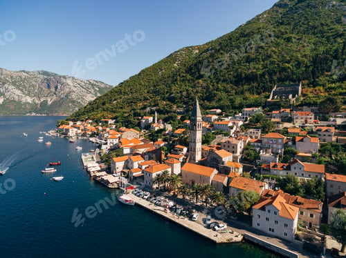 Preview: Drone view of the Perast coast with ancient houses and a tower. Montenegro