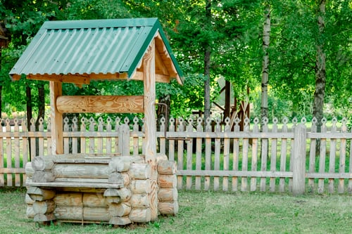 Preview: wooden well, copy space. Russian traditions. Village life