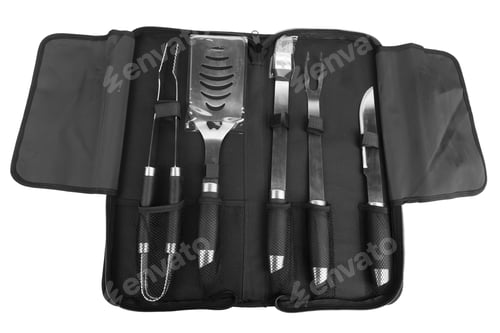 Preview: Set of tools for bbq in black bag. Isolated over white background. Close-up.