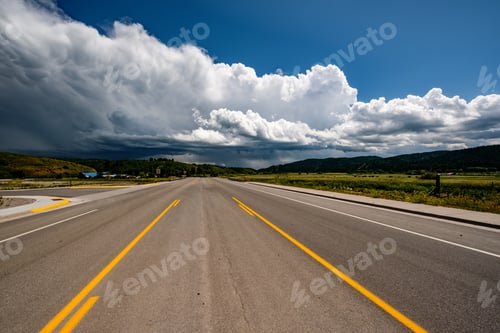 Preview: Empty open highway and stormy clouds in Wyoming