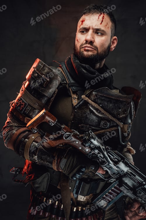Preview: Serious apocalyptic guy with shotgun poses in dark background