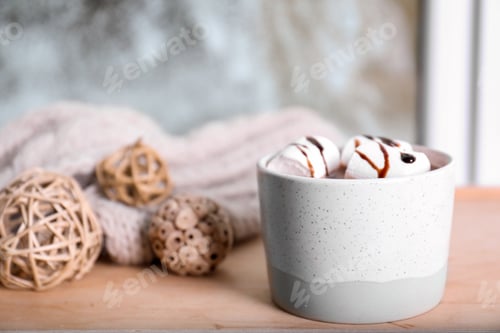 Preview: Cup of aromatic cacao with marshmallows on wooden table