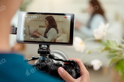 Preview: Filming a Woman Using a Laptop in a Cozy Living Room During a Bright Afternoon