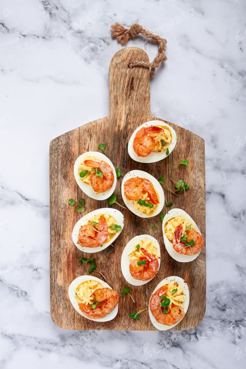 Preview: Boiled eggs stuffed with yolk and seasoned with mayonnaise, stuffed eggs with shrimp,
