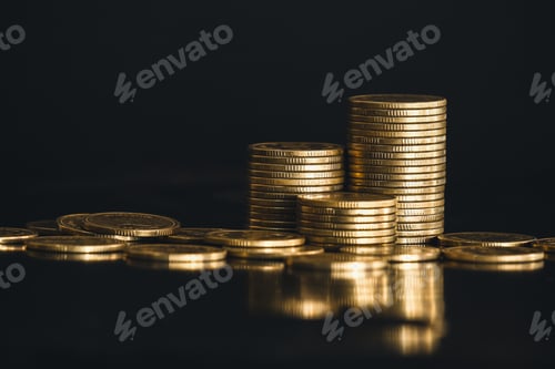 Preview: close up stack of golden money coin on black background.