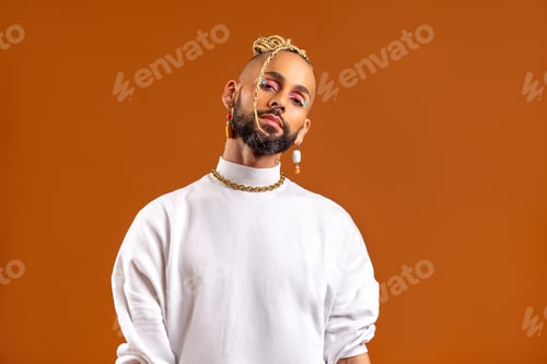 Preview: Black latin gay man isolated on orange background