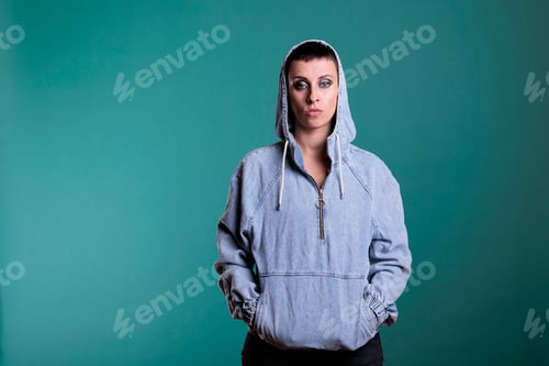 Preview: Portrait of unhappy upset woman looking nervous at camera while posing over isolated background