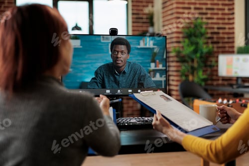 Preview: Manager women analyzing recruiter cv discussing job offer