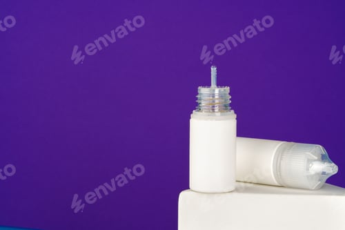 Preview: Vape liquid dripping with cap on purple background
