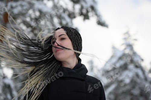 Preview: Young woman with African braids