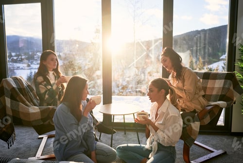 Preview: Young women enjoying winter weekends inside of contemporary barn house.