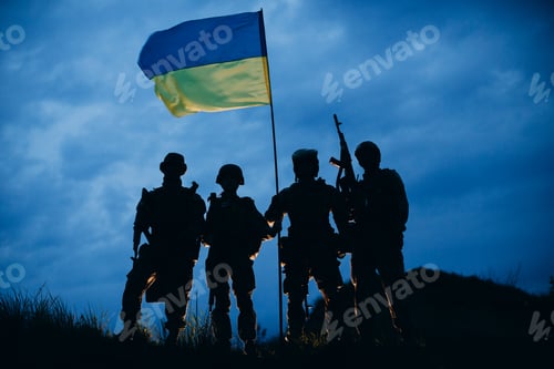 Preview: Four armed Ukrainian soldiers with a national flag in the evening