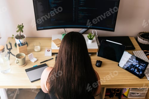 Preview: Coding from Comfort: Young Woman Mastering Software Development from Home