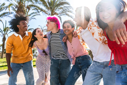Preview: Multiethnic group of young happy friends hanging out