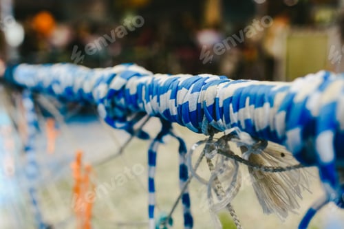 Preview: Fabric ties on a fence.