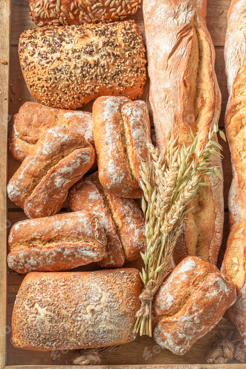 Preview: Tasty baguettes and buns freshly baked in bakery