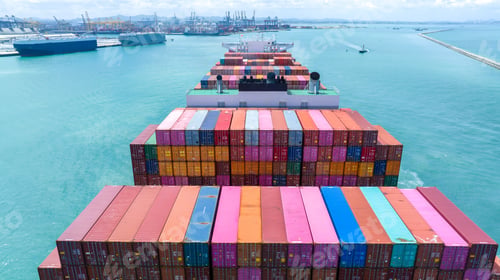 Preview: Stern of large cargo container ship import export container box on the ocean sea on blue sky