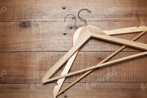 Preview: Wooden Hangers on a Weathered Wooden Background