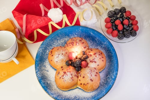 Preview: Home cooking concept. Fresh homemade sweet soft milk bread filled with cream decorated with berries