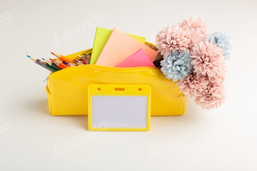 Preview: front view yellow pencil-case with colorful pencils flowers and stickers on white background color