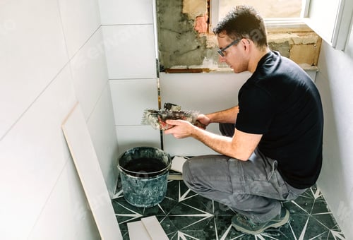 Preview: Mason working on a bathroom renovation