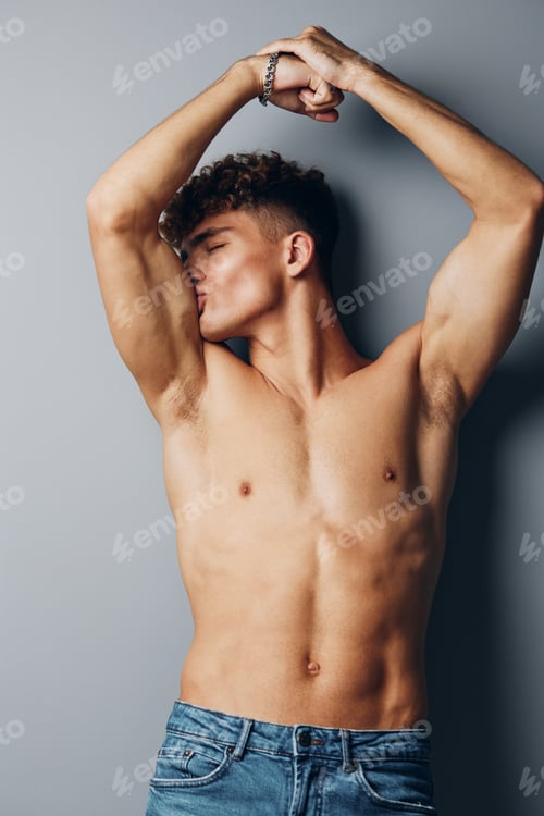 Preview: man gray background athletic background adult fashion bodybuilder care muscular muscle young curly