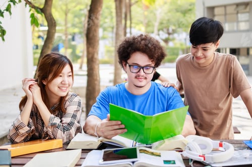 Preview: A happy attractive Student group and tutoring education concept.