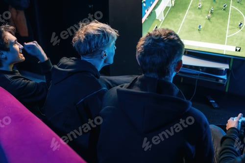 Preview: Close up view of hands of gamers that playing game on console