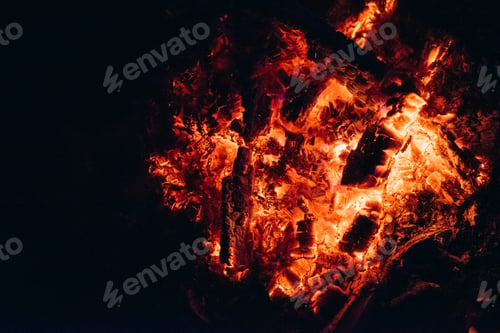Preview: bright embers of a burning fire