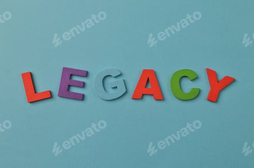 Preview: Colorful alphabet letters with text LEGACY isolated on a blue background
