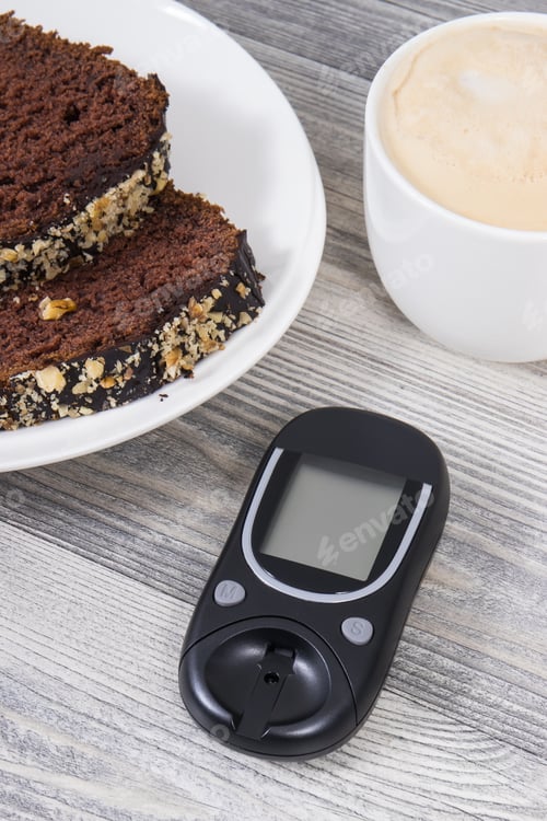 Preview: Glucometer for measuring sugar level, sweet chocolate cake and cup of coffee