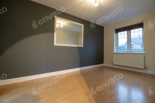 Preview: A Brand New Modern British Home Showing The Dining Room With Newly Fitted Wooden Floors Looking Out