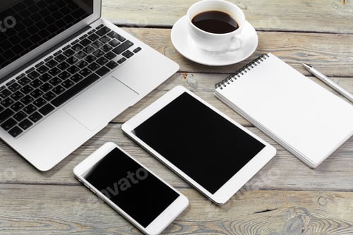 Preview: Open laptop with digital tablet and smartphone close up