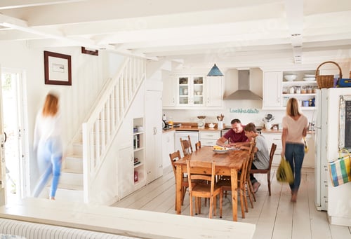 Preview: Interior Of Busy Family Home With Blurred Figures