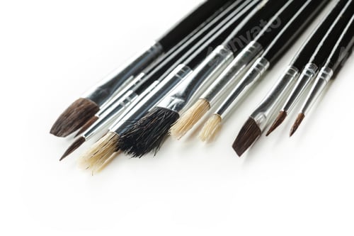Preview: close up of paint brushes on white background