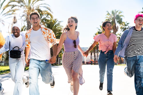 Preview: Multiethnic group of young happy friends hanging out