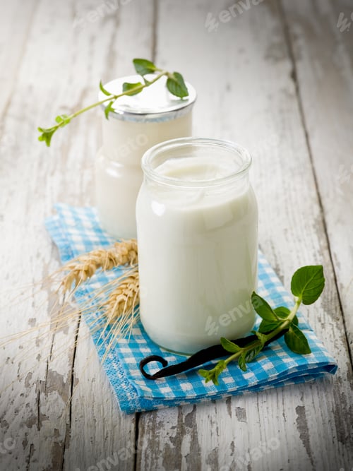 Preview: yogurt with vanilla stick and mint leaves