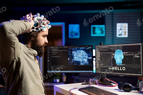 Preview: Man placing EEG headset on heat to communicate with artificial intelligence