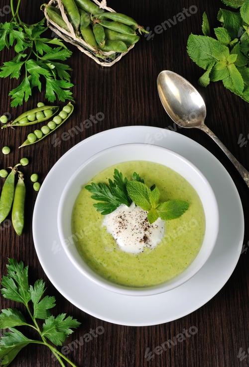 Preview: Portion cream soup with green peas with mint cream