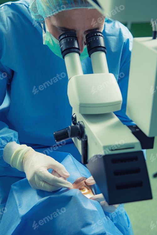 Preview: Surgeon Using Microscope for Eye Surgery Procedure