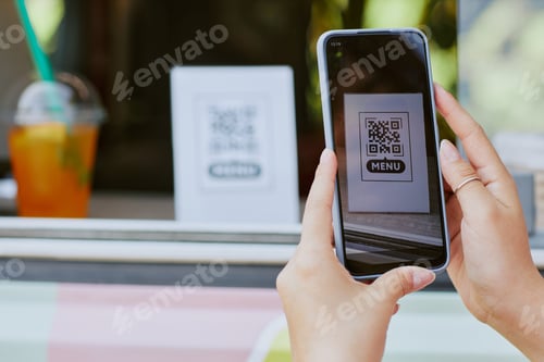 Preview: Woman Scanning QR Code