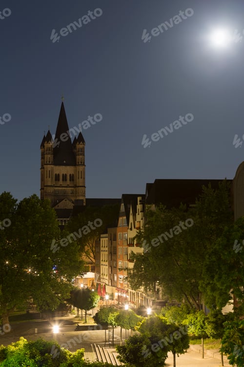 Preview: Elevated cityscape with Great St Martin Church at night, Cologne, Germany