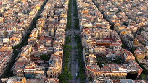 Preview: Aerial view of Passeig de Gracia major avenues in Barcelona in summer day at sunrise