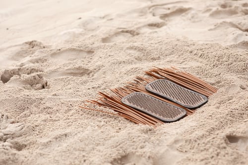 Preview: sadhu boards stand on a sandy seashore, the concept of yoga practice, meditation